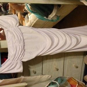 Mid calf length white dress it can be worn off the shoulder it's